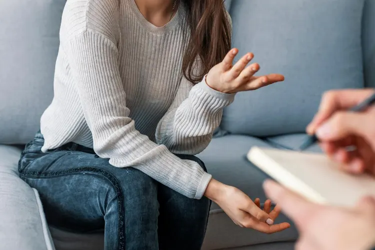 Woman talking to her therapist regarding the benefits of having an ESA.